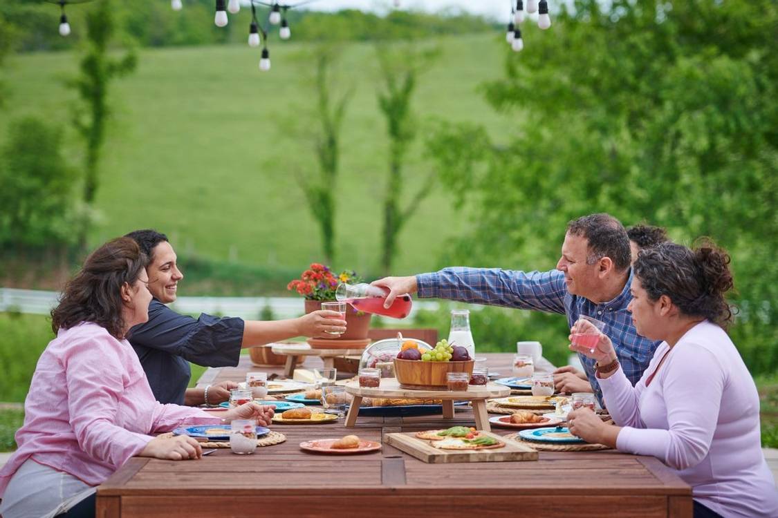 A family enjoying their meal at the Eupepsia Wellness resort
